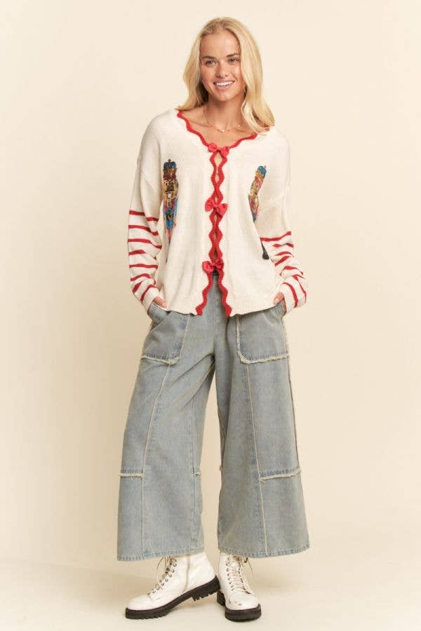 SEQUIN NUTCRACKER PATCH BOW DETAL SWEATER TOP