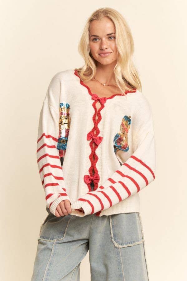 SEQUIN NUTCRACKER PATCH BOW DETAL SWEATER TOP