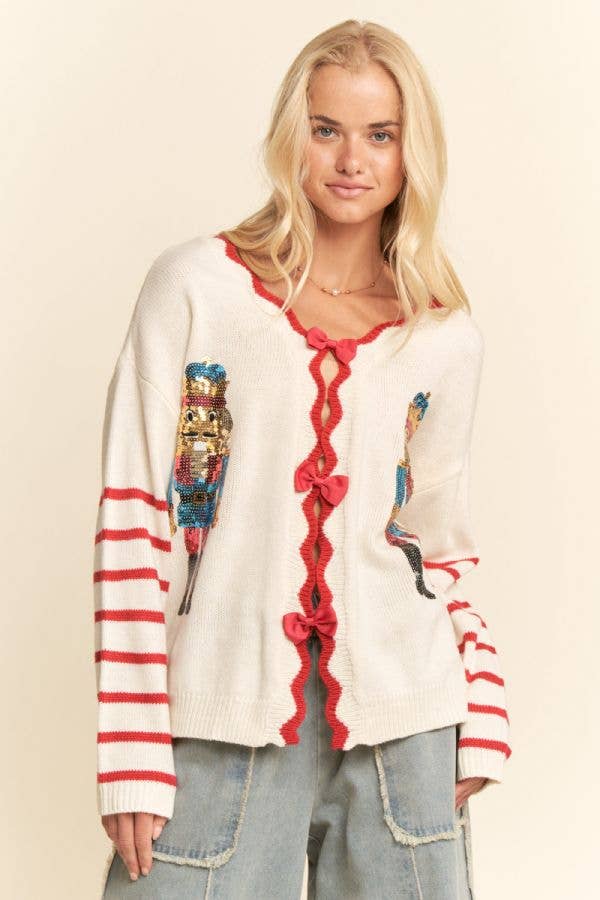 SEQUIN NUTCRACKER PATCH BOW DETAL SWEATER TOP