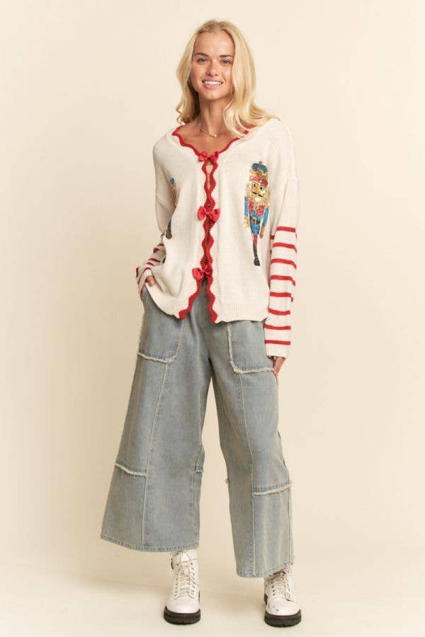 SEQUIN NUTCRACKER PATCH BOW DETAL SWEATER TOP
