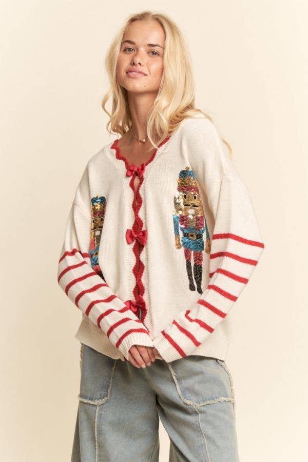 SEQUIN NUTCRACKER PATCH BOW DETAL SWEATER TOP